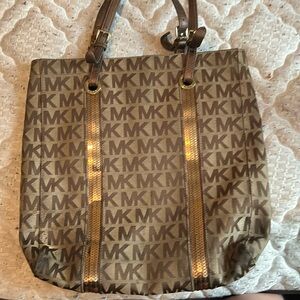 This is a vintage Micheal Kora bag.